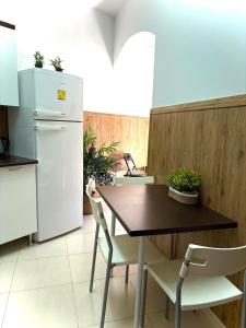 Kuchyň nebo kuchyňský kout v ubytování Casa Rural la Plaza