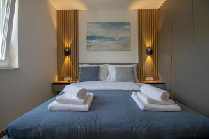 Katil atau katil-katil dalam bilik di Apartments VaMar