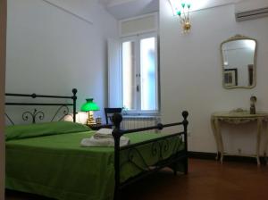 Postel nebo postele na pokoji v ubytování Antica Dimora