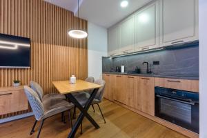 Køkken eller tekøkken på Apartman & Spa Lukas Zlatibor