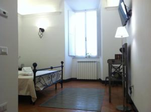 Postel nebo postele na pokoji v ubytování Antica Dimora