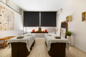 Кровать или кровати в номере VIVA Cala Mesquida Suites & Spa Adults Only 16