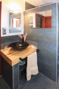 a bathroom with a sink and a mirror at Casa Marron Boutique Home in Benissa +32 photos