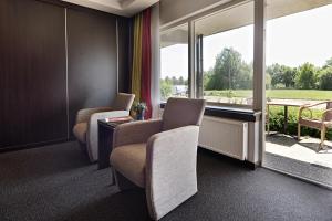 Posezení v ubytování Van der Valk Hotel Groningen Zuidbroek