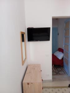 TV a/nebo společenská místnost v ubytování Deli casa vacanze + 4 fotografie