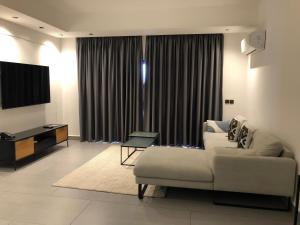 Televisyen dan/atau pusat hiburan di Dac Apartments