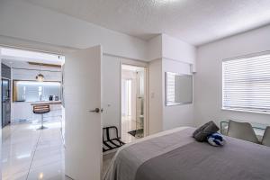 Ένα ή περισσότερα κρεβάτια σε δωμάτιο στο Sunrise Penthouse