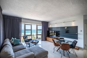 Χώρος καθιστικού στο Sunrise Penthouse