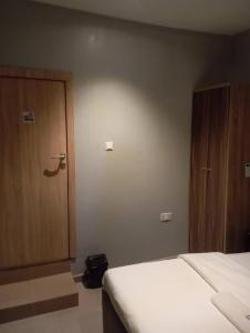 Postel nebo postele na pokoji v ubytování Edebengz Luxury Hub