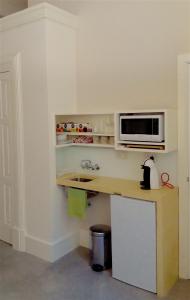 Kuchyň nebo kuchyňský kout v ubytování Palatial Flat inside Bright Duplex Penthouse