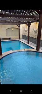 A piscina localizada em Villa Alyossef at Elshikh Zayed ou nos arredores