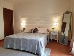 Postel nebo postele na pokoji v ubytování Il Borgo di San Gervasio