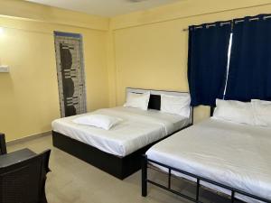 Postel nebo postele na pokoji v ubytování Hotel Bindusagar - Budget Rooms & Dormitory near Sri Lingaraja Temple