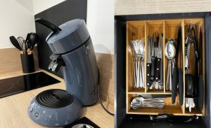 a mixer sitting on top of a counter next to a drawer at Le Chti nid d'Opale in Boulogne-sur-Mer