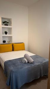 Postel nebo postele na pokoji v ubytování Appartement au cœur des arènes