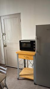 Kuchyň nebo kuchyňský kout v ubytování Appartement au cœur des arènes