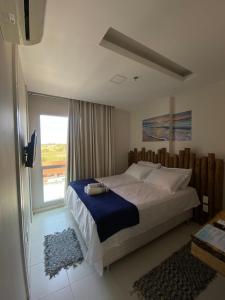 Postel nebo postele na pokoji v ubytování Apartamento Pé na Areia 212 - Apartamento Beira Mar 210 - Cabo Frio + 37 fotografií