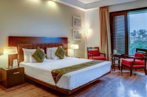 Postel nebo postele na pokoji v ubytování Amber Inn by Orion Hotels + 37 fotografií