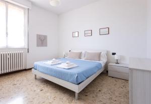 Postel nebo postele na pokoji v ubytování IseoLakeRental - Casa Pluto