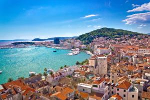 an aerial view of a city and a harbor at Apartment Luce in Split