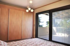 Ένα ή περισσότερα κρεβάτια σε δωμάτιο στο Charming Villa with Seaview in a Gated Complex +28 φωτογραφίες