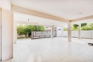 Ein Balkon oder eine Terrasse in der Unterkunft Super Collection O Sholinganallur Chennai Formerly Nimalan Residenc