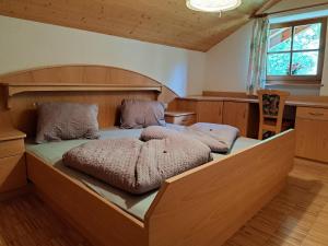 Ένα ή περισσότερα κρεβάτια σε δωμάτιο στο Appartements Bacher Hof