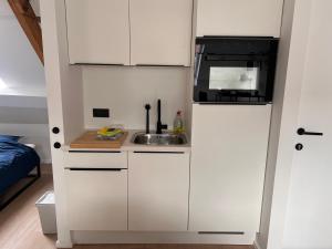 Kitchen o kitchenette sa Studio Laurent - Gitoo