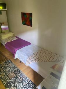 Postel nebo postele na pokoji v ubytování B&B LOKEV Sezana
