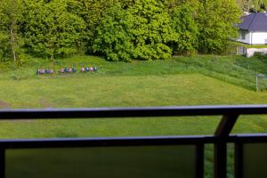 a group of people playing soccer in a field at Peaceful Apartment Wrzosowo Bay with Parking by Noclegi Renters in Wrzosowo