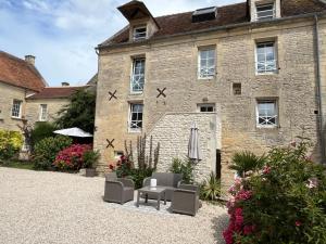 Aed väljaspool majutusasutust Chambres d’hôtes de l’Ancienne Auberge