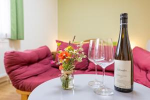 Nápoje v ubytovaní Weingut - Gästezimmer zum Schwalbennest + 15 fotografií