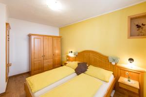 Posteľ alebo postele v izbe v ubytovaní Weingut - Gästezimmer zum Schwalbennest