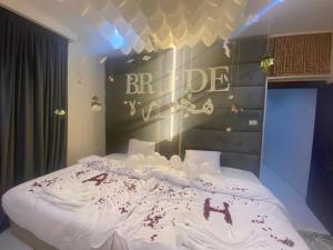 Rúm í herbergi á Rehana Pyramids Hotel