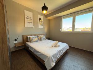 Postel nebo postele na pokoji v ubytování Luxury Central Apartment in Ohrid