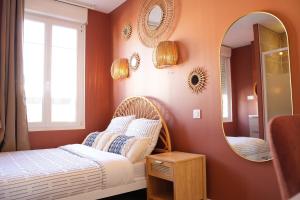 Postel nebo postele na pokoji v ubytování La Parenthèse Savane + 27 fotografií