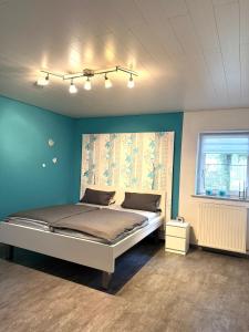 Postel nebo postele na pokoji v ubytování Ferienwohnung Haus Angela
