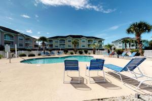 Bazén v ubytování Magnolia North 303 nebo v jeho okolí