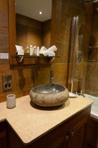 Ένα μπάνιο στο Studford Luxury Lodges