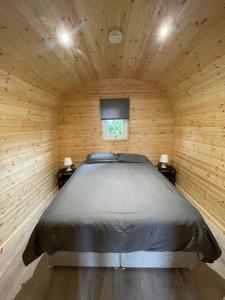 Postel nebo postele na pokoji v ubytování Sutton Fields Pod