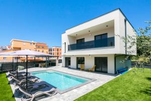 an image of a house with a swimming pool at Villa Mila - NEW 2025 in Medulin