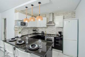 Køkken eller tekøkken på S15 Latitude Palace - un cocon face à la mer