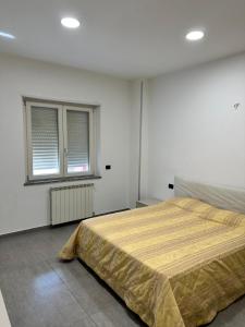 Postel nebo postele na pokoji v ubytování B&B IN Family