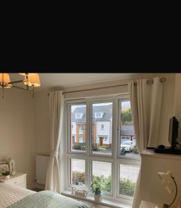 Postel nebo postele na pokoji v ubytování Room near M4, Great Western Hospital