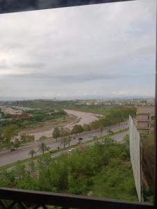 a view of a road from a balcony at Brick Accent Loft 1BHK with Balcony & Free Netflix in Rawalpindi