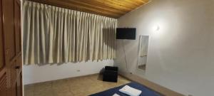 Et tv og/eller underholdning på La Pascana Cajamarca MiniDepa Jr Ayacucho