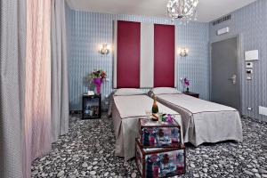 Krevet ili kreveti u jedinici u objektu Hotel Relais Dei Papi