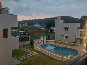 Bazén v ubytování The green pride resorts nebo v jeho okolí