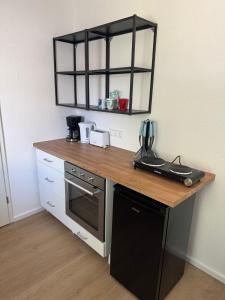 Dapur atau dapur kecil di Monteurswohnung Ferienwohnung Philippsburg