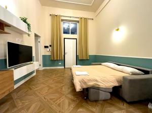 Μια τηλεόραση ή/και κέντρο ψυχαγωγίας στο Loft The Palm - Metro M2, Spazioso & Parcheggio +21 φωτογραφίες